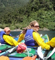  A Kayak Guide with guests on Doubtful Sound New Zealand  